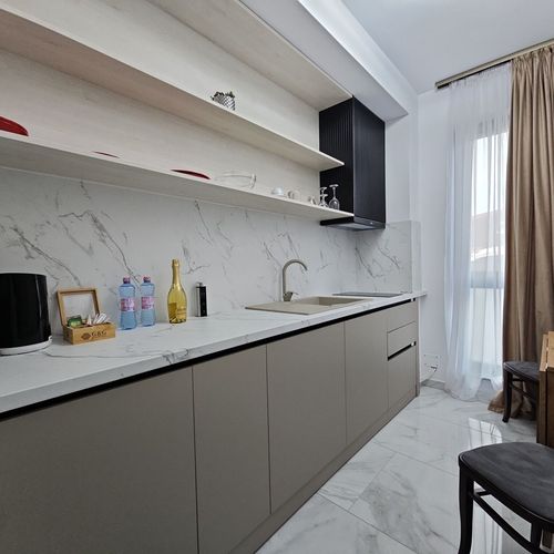 Apartament confort la parter cu 1 camera pentru 2 pers.