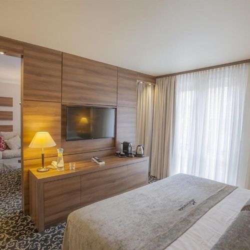 Apartament 3-osobowy Junior z widokiem na ogród z 2 pomieszczeniami sypialnianymi