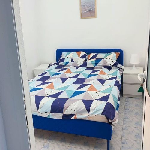 Suita la parter cu vedere spre curte cu 2 camere pentru 4 pers.