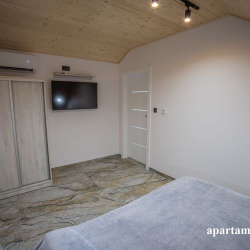 Apartament 4-osobowy Family z tarasem z 2 pomieszczeniami sypialnianymi