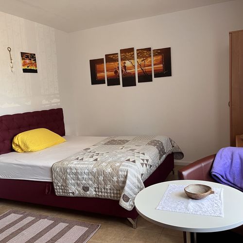 Apartament 4-osobowy na parterze z widokiem na ogród z 2 pomieszczeniami sypialnianymi