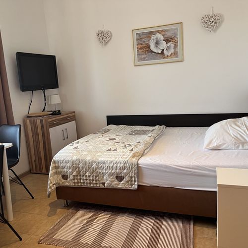 Apartament 4-osobowy na piętrze z widokiem na ogród z 2 pomieszczeniami sypialnianymi