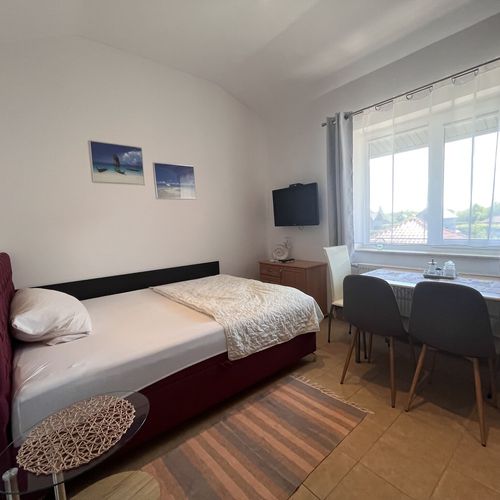 Apartament 4-osobowy na piętrze z widokiem na ogród z 2 pomieszczeniami sypialnianymi