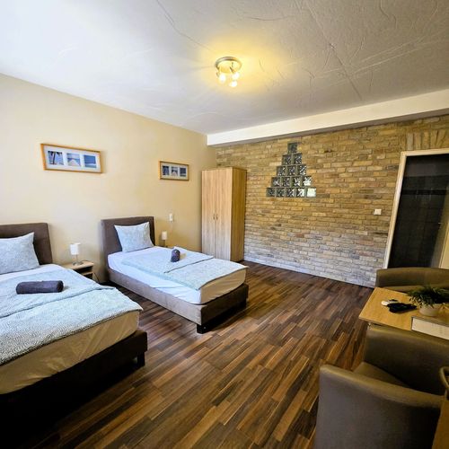 Apartament 7-osobowy na parterze z 1 pomieszczeniem sypialnianym (możliwa dostawka)