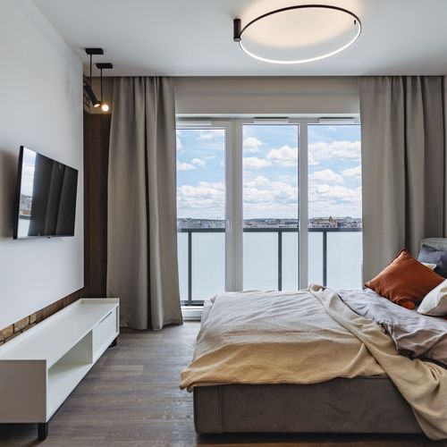 Apartman s balkónem s manželskou postelí s 1 ložnicí s výhledem na město