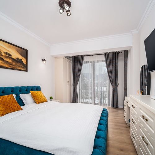 Apartament studio la parter cu 2 camere pentru 4 pers.