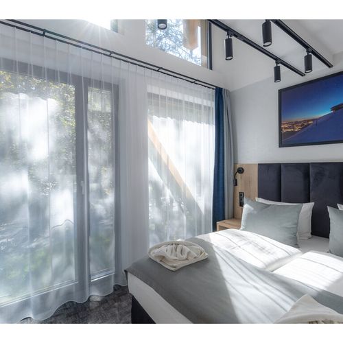 Apartament 4-osobowy z 1 pomieszczeniem sypialnianym
