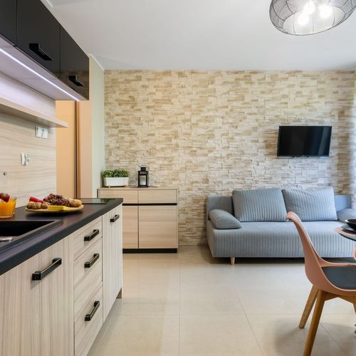 Apartament 4-osobowy z balkonem z 1 pomieszczeniem sypialnianym