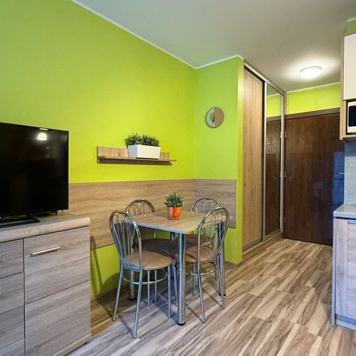 Apartament 4-osobowy z balkonem z 1 pomieszczeniem sypialnianym