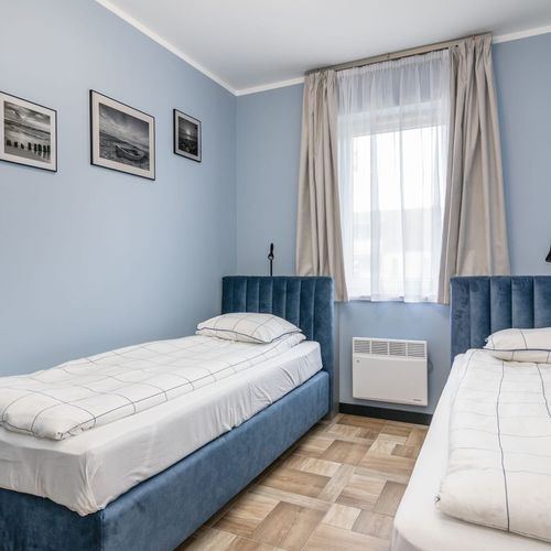 Apartament 6-osobowy z balkonem z 3 pomieszczeniami sypialnianymi