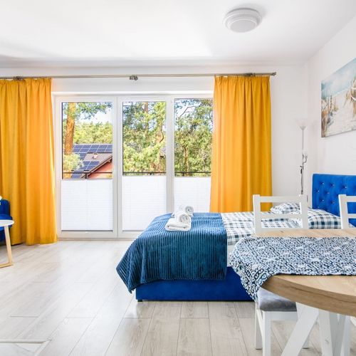 Apartament 4-osobowy z balkonem z klimatyzacją z 1 pomieszczeniem sypialnianym