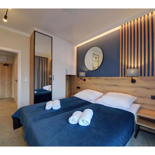 Apartament 4-osobowy z widokiem na las z widokiem na góry z 2 pomieszczeniami sypialnianymi