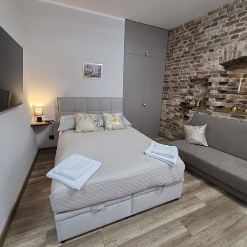 Apartament 4-osobowy z balkonem z własną kuchnią z 1 pomieszczeniem sypialnianym