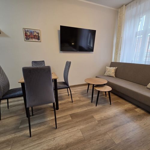 Apartament 4-osobowy z łazienką z własną kuchnią z 1 pomieszczeniem sypialnianym