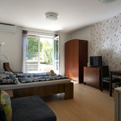 Apartament silver cu grădină cu 1 camera pentru 3 pers.