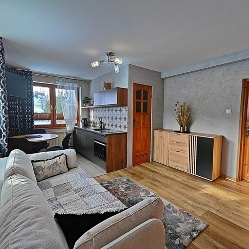 Apartament 4-osobowy na piętrze z widokiem na góry z 2 pomieszczeniami sypialnianymi