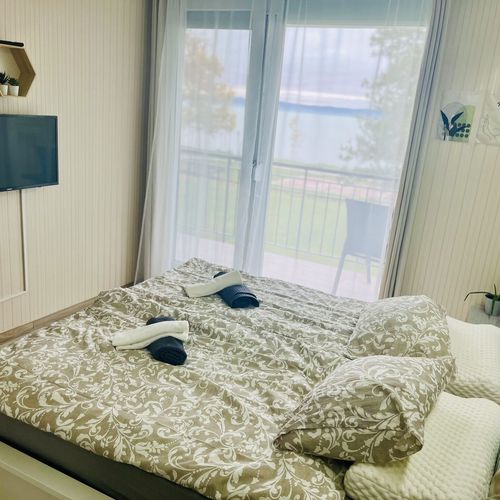 Apartament cu panoramă cu vedere spre lac cu 2 camere pentru 4 pers.