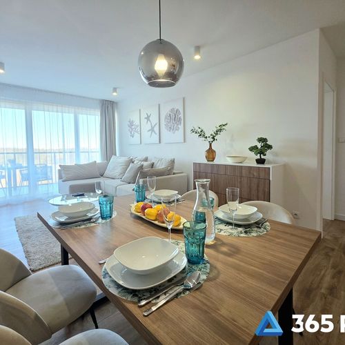 Apartament 4-osobowy z balkonem z aneksem kuchennym z 2 pomieszczeniami sypialnianymi