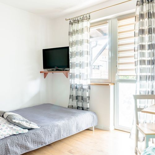 Pokój 4-osobowy z balkonem z aneksem kuchennym