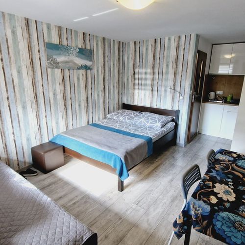 Pokój 4-osobowy na piętrze z aneksem kuchennym