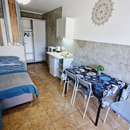 Pokój 4-osobowy na parterze z widokiem na ogród