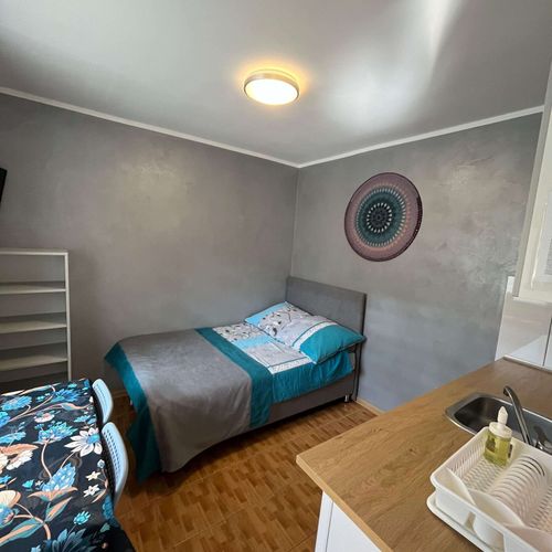 Apartament 4-osobowy na parterze z widokiem na ogród z 2 pomieszczeniami sypialnianymi