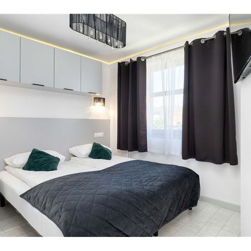 Apartament 4-osobowy z 2 pomieszczeniami sypialnianymi