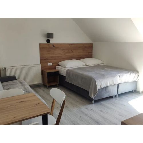 Apartament 4-osobowy z 2 pomieszczeniami sypialnianymi (możliwa dostawka)