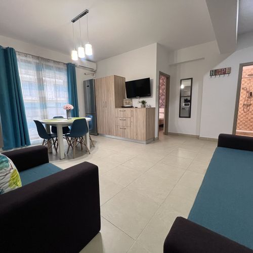 Apartament 4-osobowy na parterze z balkonem z 2 pomieszczeniami sypialnianymi