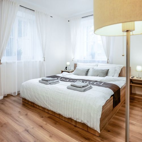Apartman s vlastní kuchyní s manželskou postelí s 1 ložnicí na přízemí