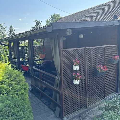 Domek drewniany 4-osobowy na parterze z widokiem na ogród