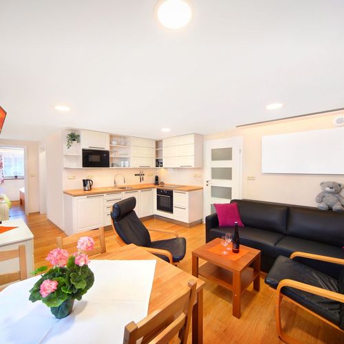 Apartament 4-osobowy na parterze Deluxe z 1 pomieszczeniem sypialnianym (możliwa dostawka)