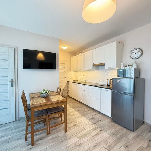 Apartament 4-osobowy na piętrze z balkonem z 2 pomieszczeniami sypialnianymi