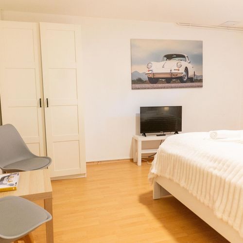 Apartament design cu vedere spre grădină cu 2 camere pentru 6 pers. (se poate solicita pat suplimentar)