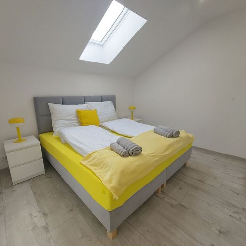 Apartament la mansardă cu aer condiționat cu 2 camere pentru 4 pers.