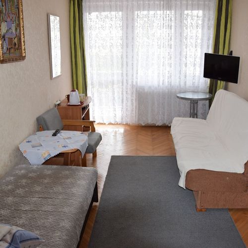 Pokój 3-osobowy z balkonem z widokiem na ogród