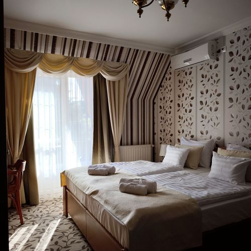 Apartament 2-osobowy na parterze z tarasem z 1 pomieszczeniem sypialnianym (możliwa dostawka)
