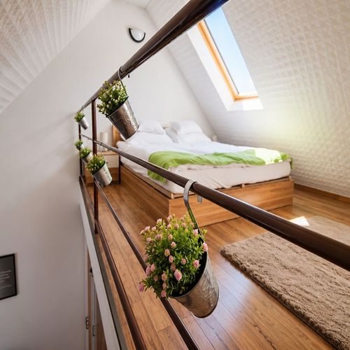 Apartament classic la mansardă cu 2 camere pentru 4 pers.