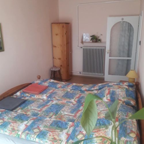Pokoj s balkónem s manželskou postelí