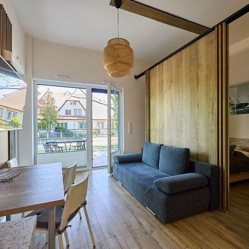 Apartament 4-osobowy na parterze z tarasem z 1 pomieszczeniem sypialnianym