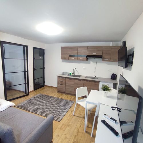 Apartament la parter la parter cu 2 camere pentru 4 pers.