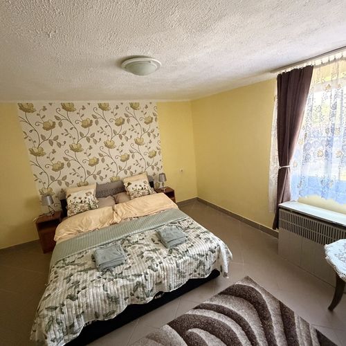 Apartament întreaga unitate cu vedere spre grădină cu 1 camera pentru 2 pers.