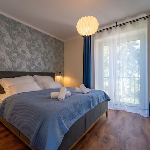 Apartament întreaga unitate cu vedere spre grădină cu 2 camere pentru 4 pers.