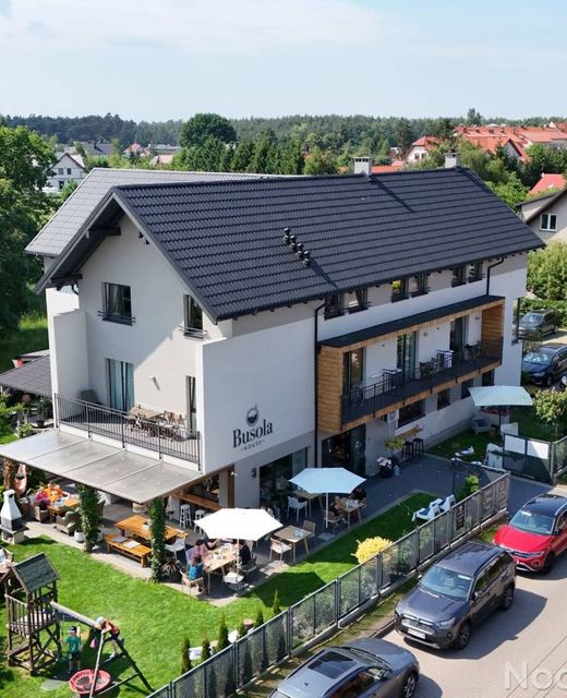 Busola House