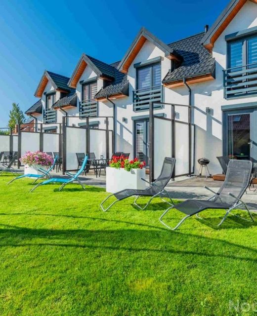 Domki Apartamentowe AURA