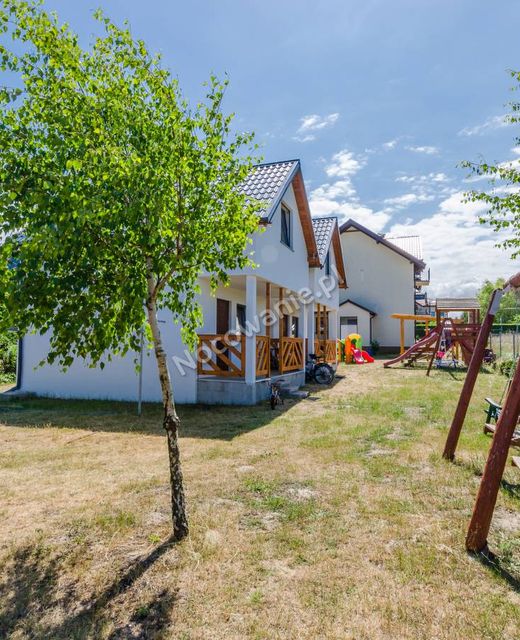 GOŚCINIEC NADMORSKI - DOMKI I APARTAMENTY