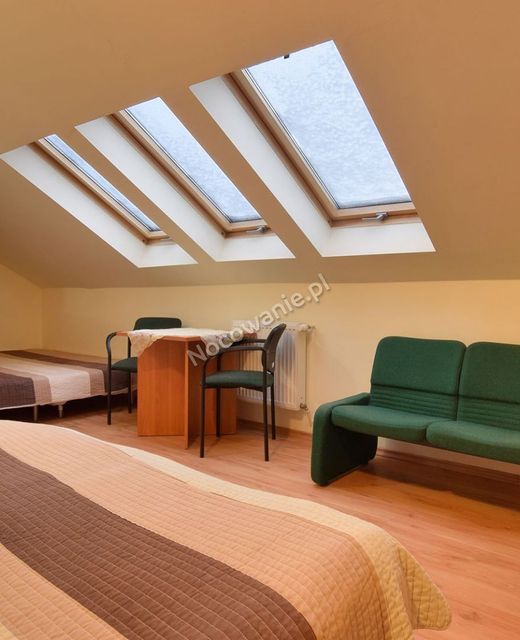 Apartamenty i Pokoje Gościnne Centrum