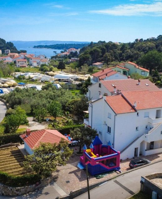 Apartments With Parking Space Palit, Rab - 4971 Palit