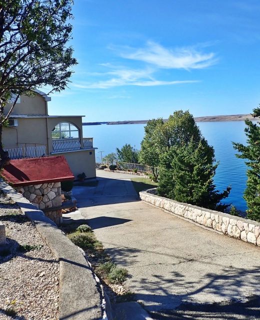 Apartment Jela-on the seafront Tribanj