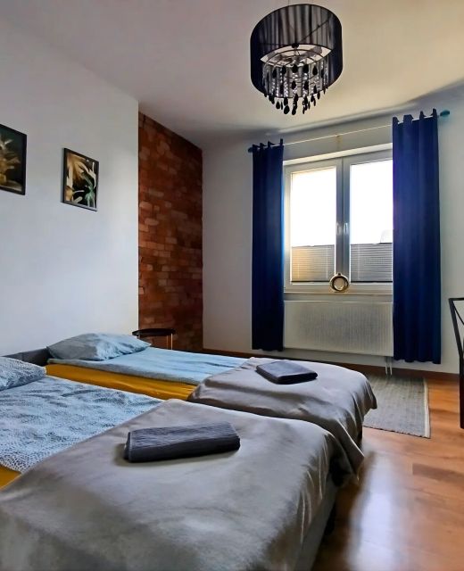 Przestronny Apartament z Trzema Sypialniami Centrum Torunia
